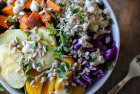 Roasted Root Vegetable Buddha Bowl with Maple Cinnamon Tahini