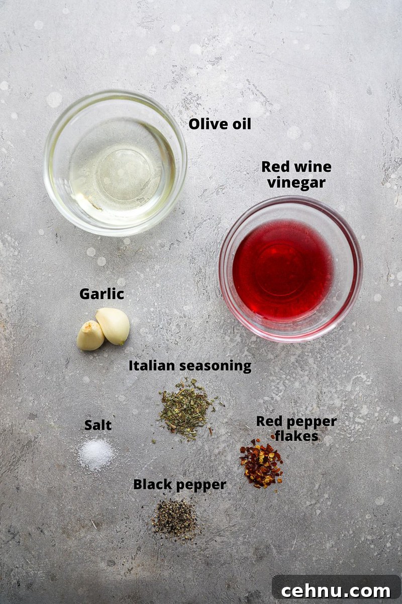 Ingredients used to make a red wine vinaigrette for Italian antipasto pasta salad
