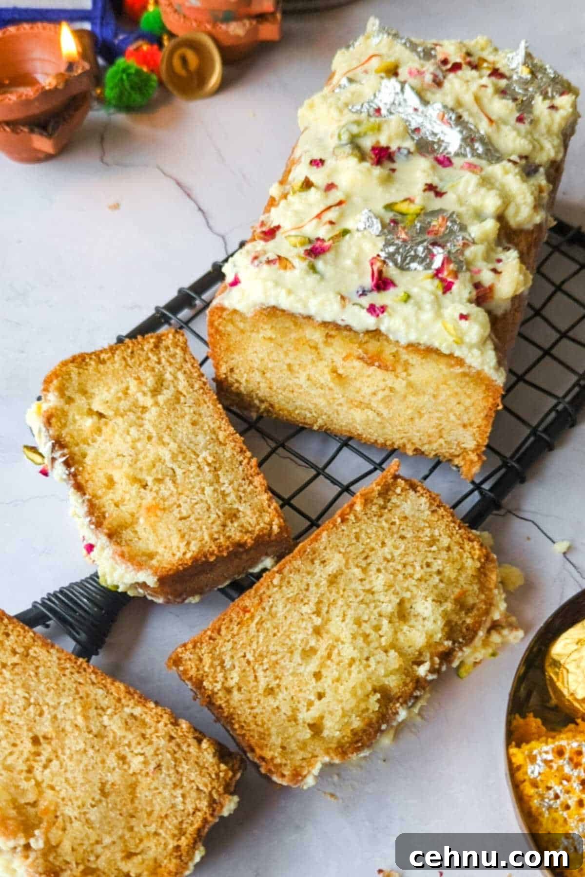 slices of gulab jamun mix cake placed on a wire rack