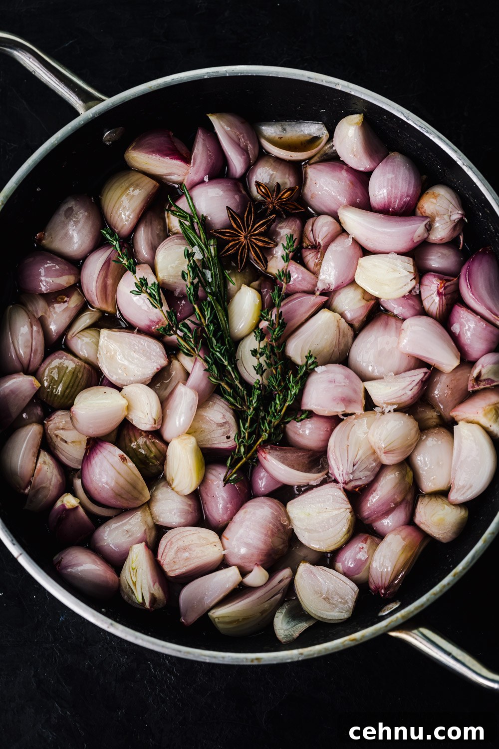 No-Knead Cranberry Rosemary Focaccia with Caramelized Shallots 4 Shallots in butter, all ready to go in the oven.