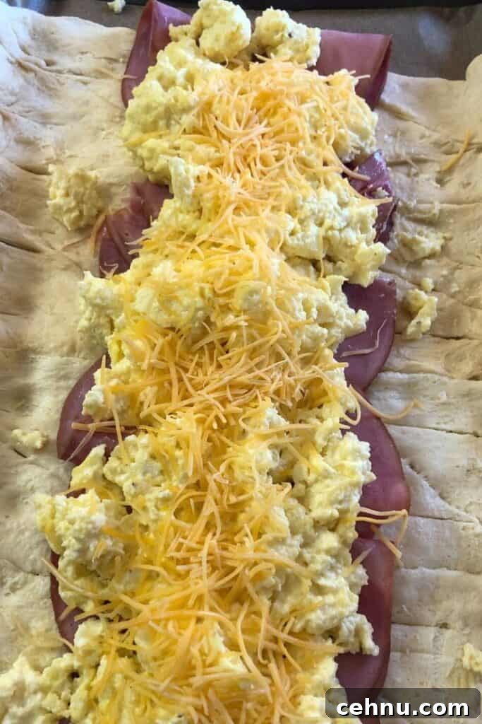 Ham, Egg and Cheese Breakfast Braid Recipe 3 Scrambled eggs with ham and shredded cheese.