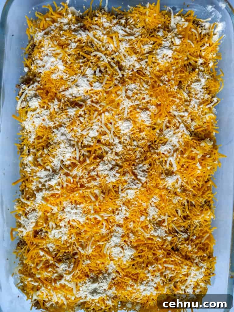 flour and ground mustard sprinkled over the cheese