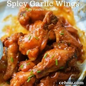 spicy garlic wings garnished with chives