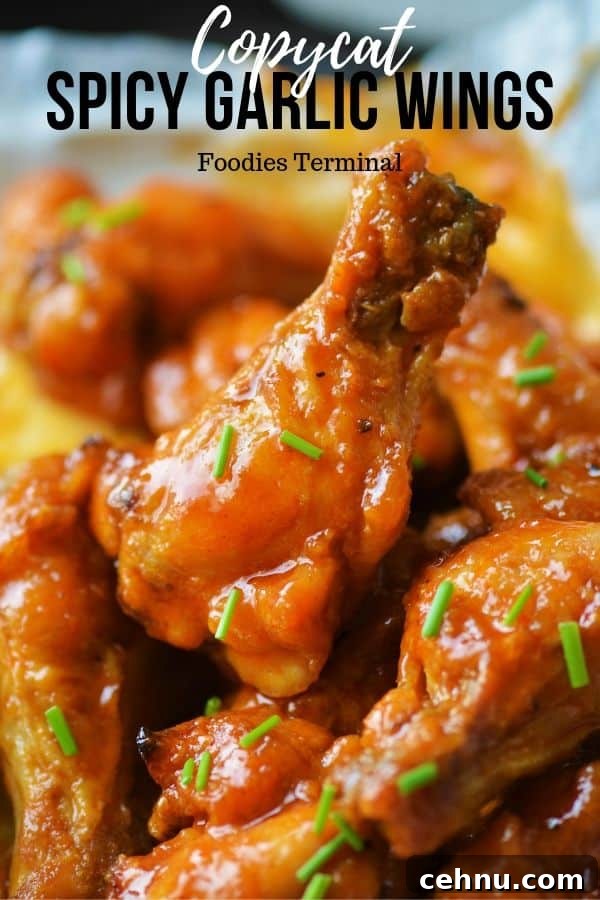 Crispy Spicy Garlic Wings Recipe 16 Buffalo wild wings copycat recipe spicy garlic chicken wings garnished with chopped chives