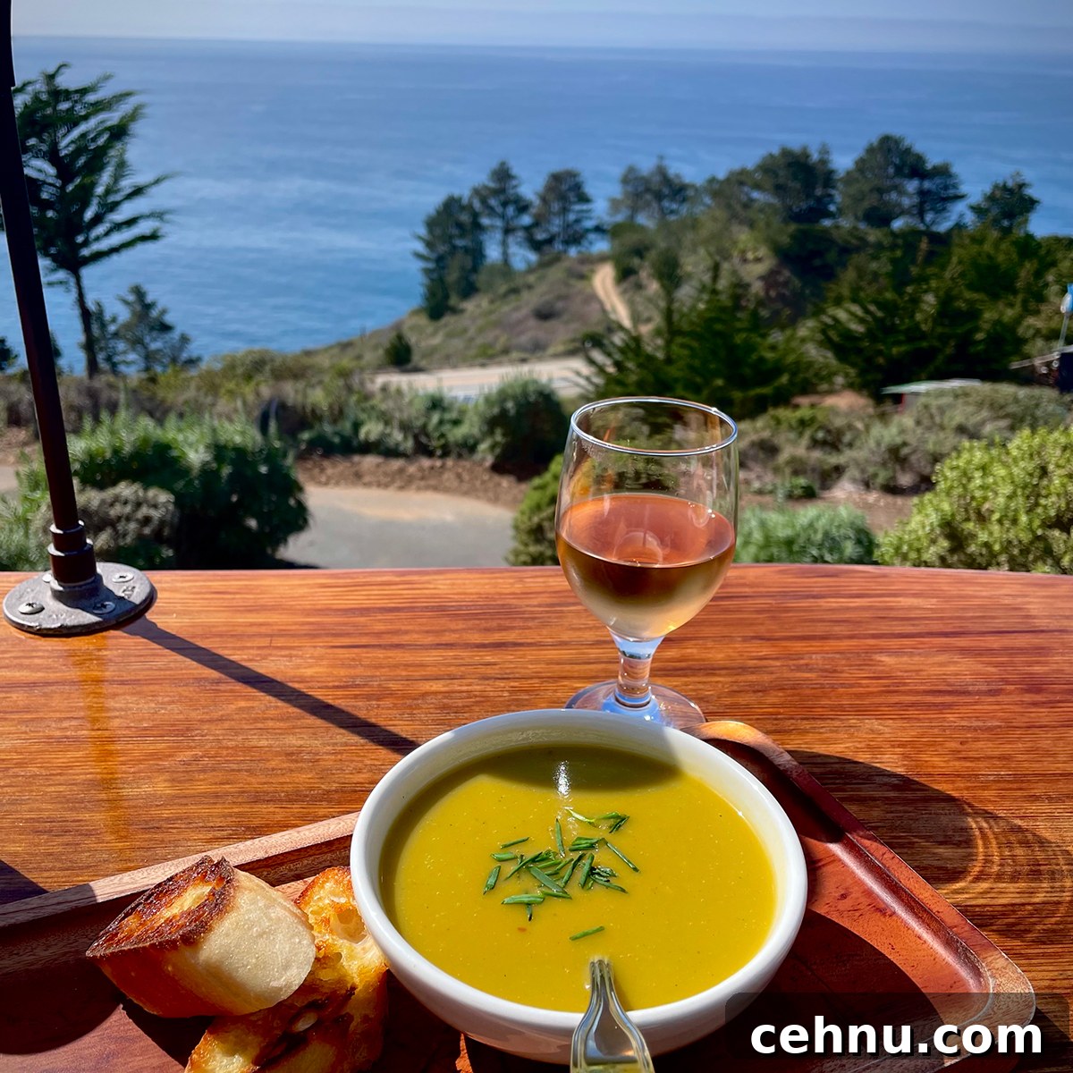 Lets Get Lost February 2022 Travel Inspiration 12 Eating lunch outside with a view of the ocean at Treebones Resort in Big Sur, California.
