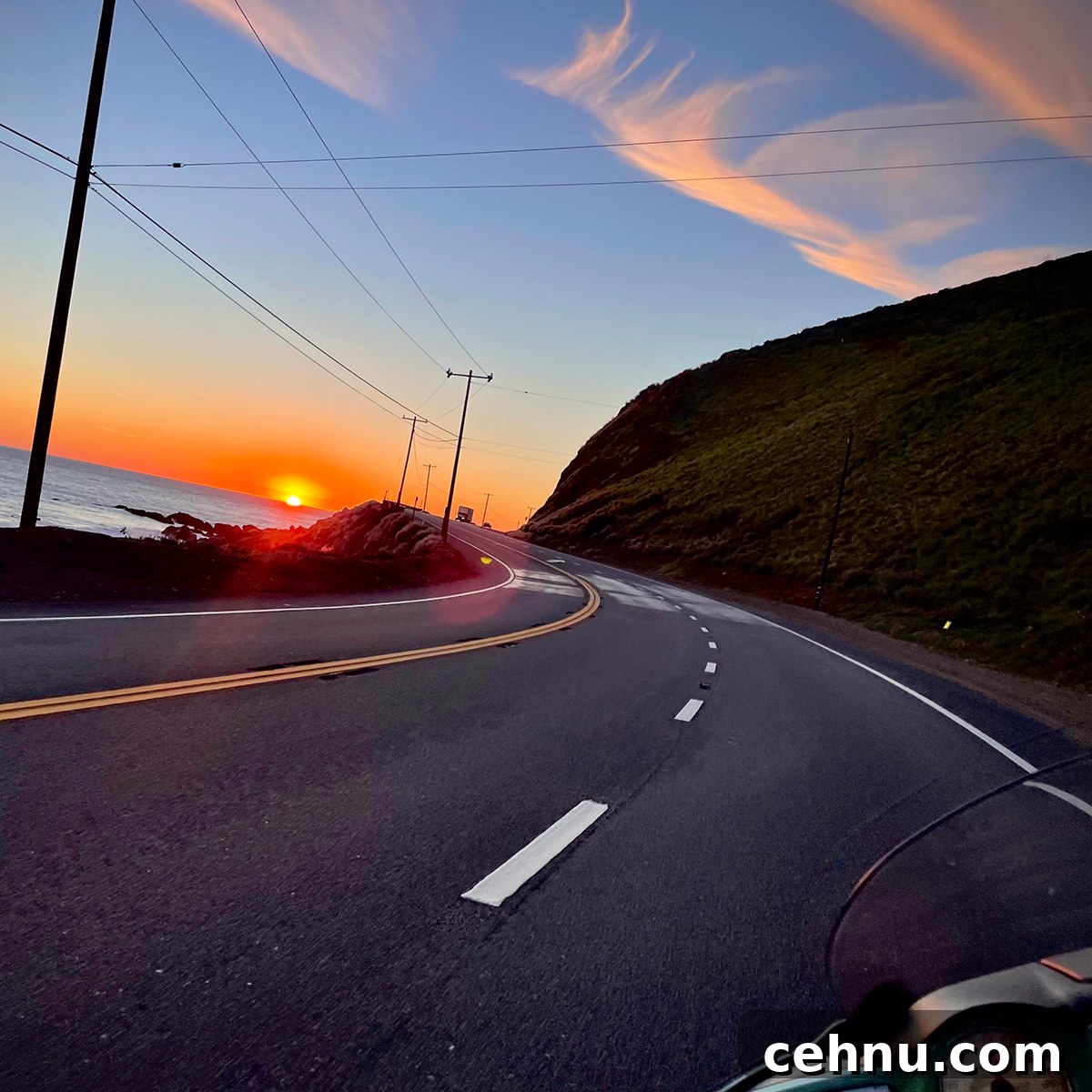 Lets Get Lost February 2022 Travel Inspiration 14 Riding a motorcycle along the California coast at sunset.