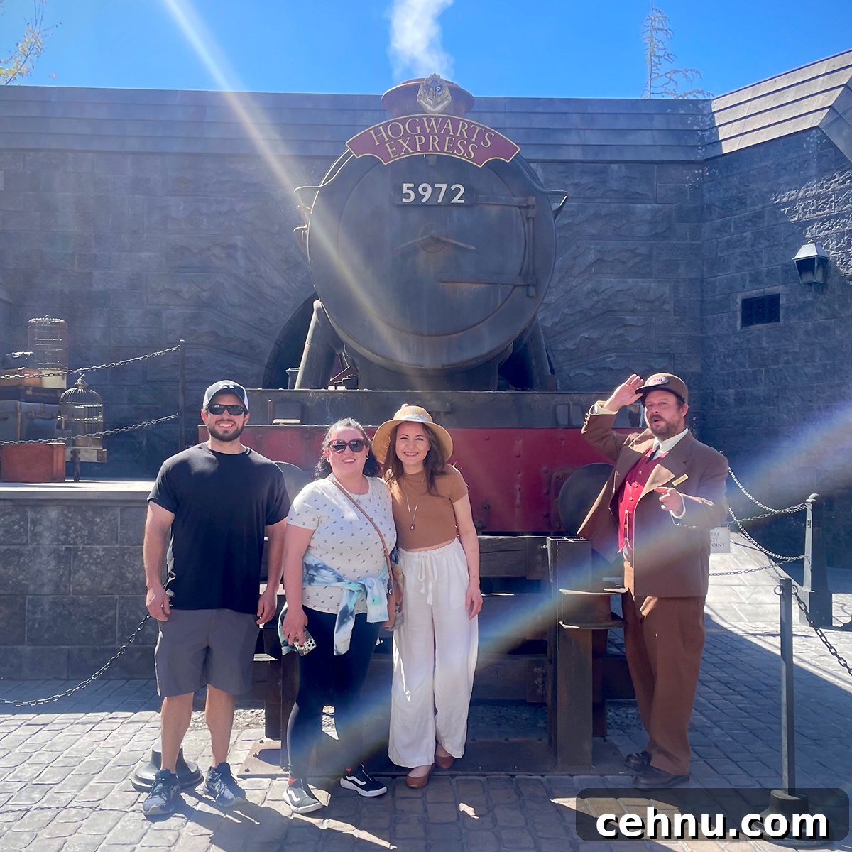 Lets Get Lost February 2022 Travel Inspiration 21 Scott, Kate, and Anne standing in front of the Hogwarts Express at Universal Studios Hollywood.