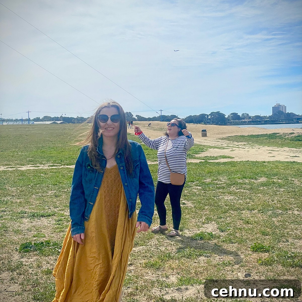Lets Get Lost February 2022 Travel Inspiration 8 Kate and Anne Blackwell flying kites on Mariners Point in San Diego.