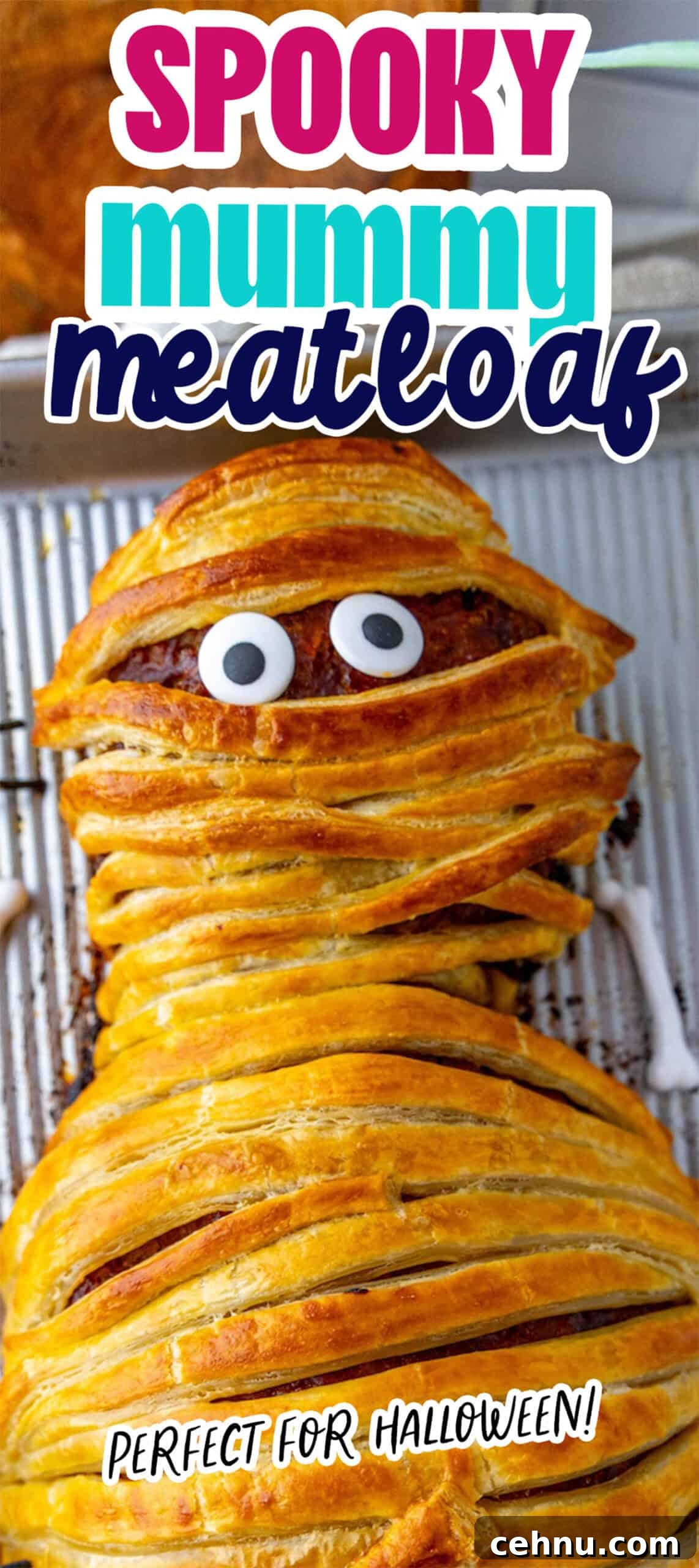 Halloween Mummy Meatloaf Recipe 20 A mummy-shaped meatloaf wrapped in pastry with eyes peeking through, labeled Spooky Mummy Meatloaf and Perfect for Halloween.
