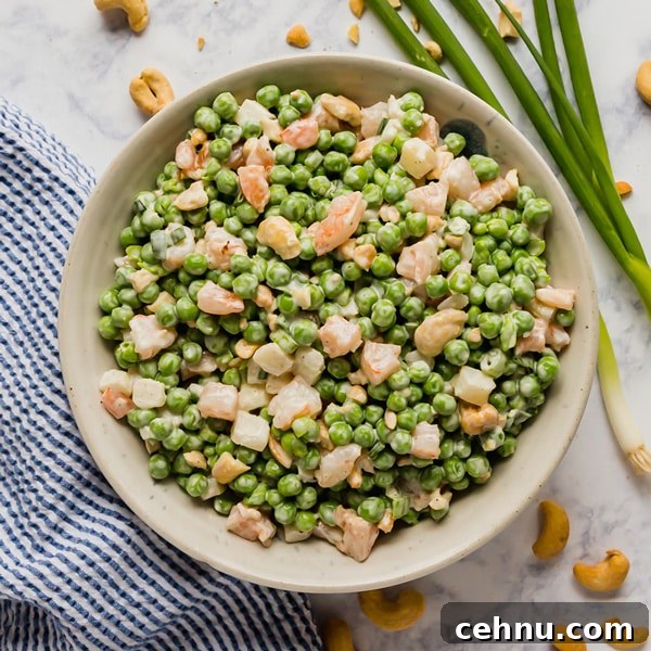 Pea salad with shrimp and crunchy ingredients.