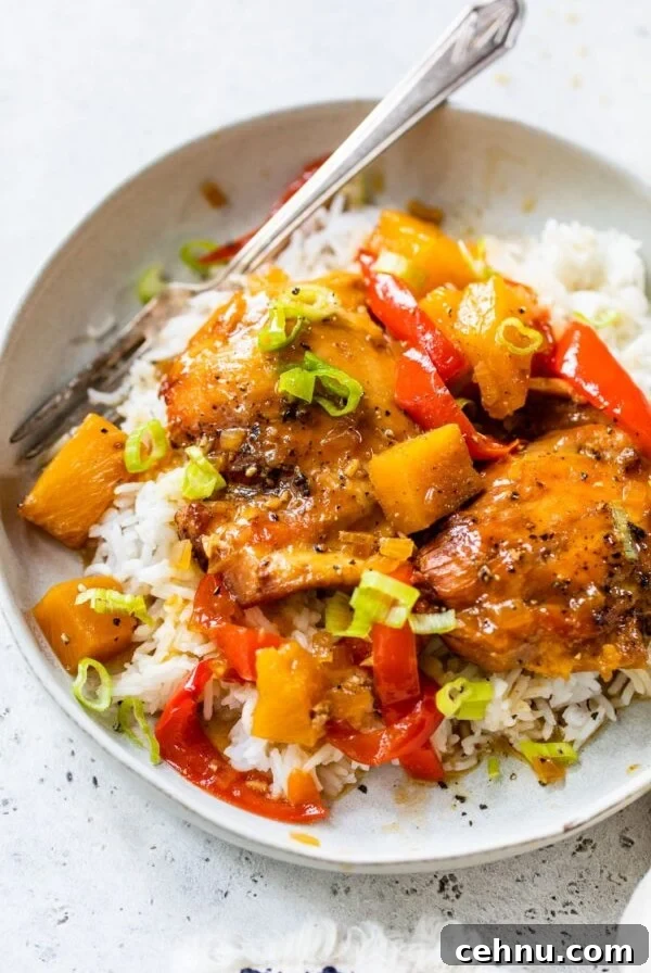hawaiian chicken in a bowl over white rice