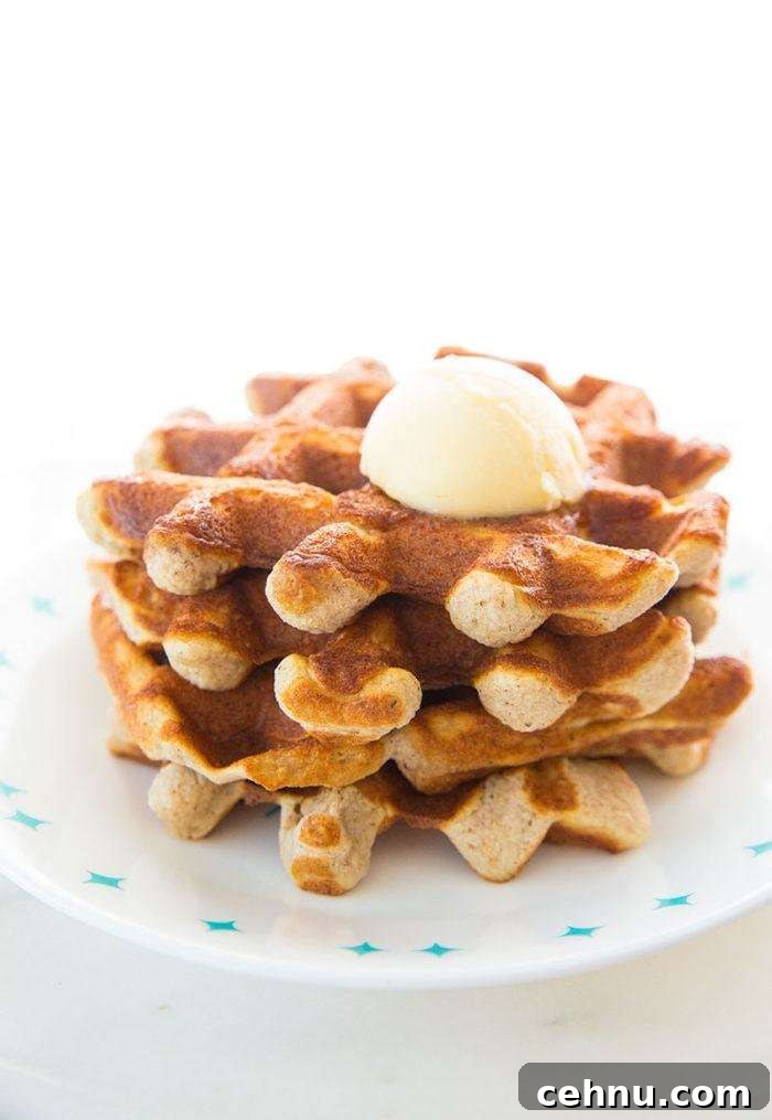 Crispy Cinnamon Almond Flour Low Carb Keto Waffles with butter on top
