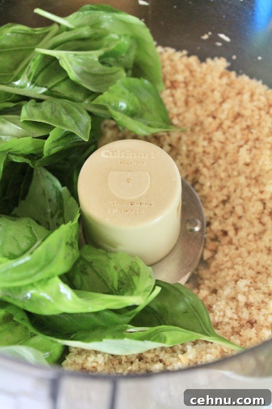 add fresh basil and olive oil and pulse in the food processor