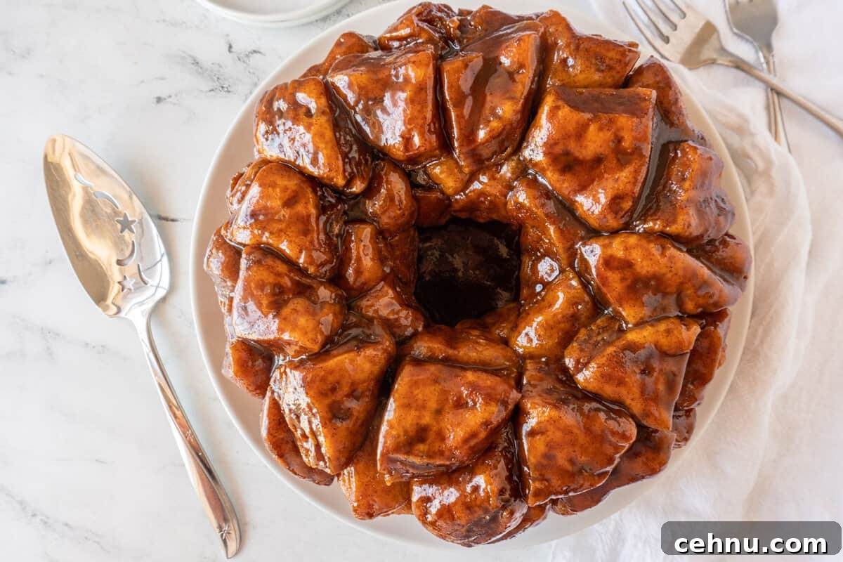 cinnamon pull apart on plate with serving spoon next to it