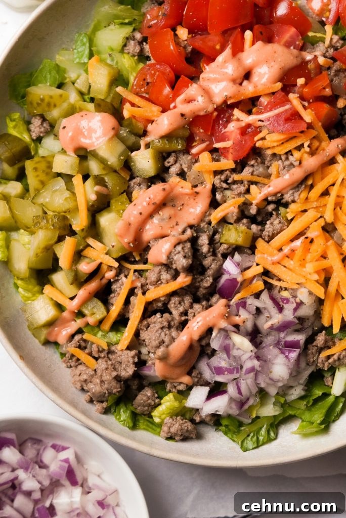 salad with burger meat and burger toppings