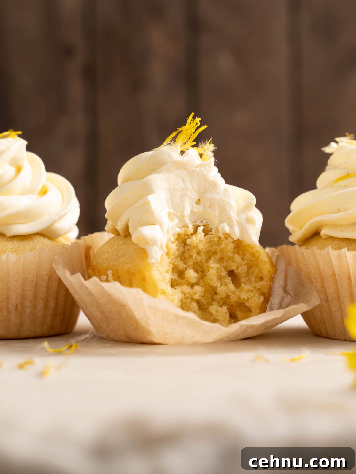 How to Make Dandelion Flower Cupcakes 4 Three dandelion cupcakes in a line