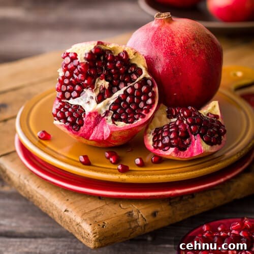 Pomegranate Guacamole Recipe with Lime and Cilantro 4 pomegranates | AFoodcentricLife.com
