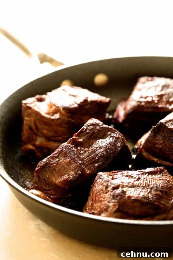 Slow Cooker Barbacoa Short Ribs with Cilantro-Lime Cauli Rice 3 Photo of short ribs being browned in a skillet.