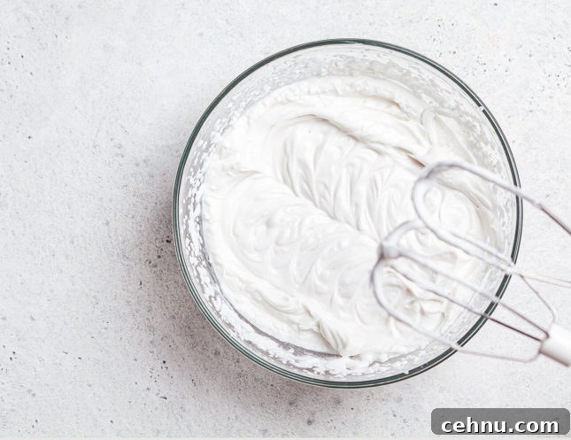 Moist Orange Yogurt Cake Recipe with Citrus Whipped Cream 3 Whipped cream is an easy way to dress up easy yogurt cake! // FoodNouveau.com