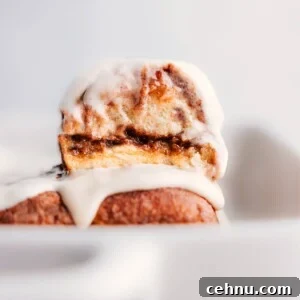 Hawaiian Roll Cinnamon Rolls stacked on top of each other.