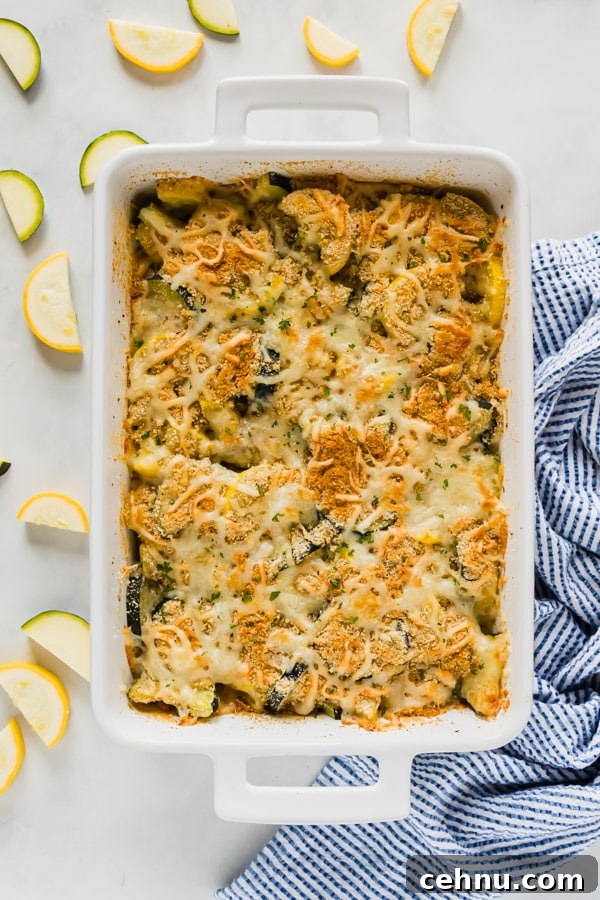 Cheesy Yellow Squash Casserole Recipe 2 An overhead image of a pan of squash casserole.