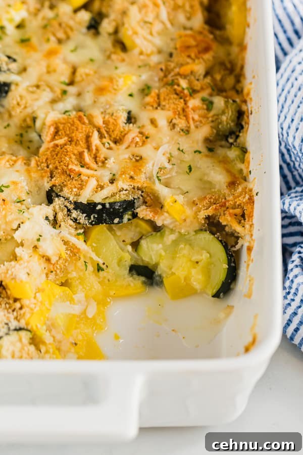 Cheesy Yellow Squash Casserole Recipe 7 The inside of a pan of squash casserole