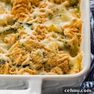Cheesy Yellow Squash Casserole Recipe 8 Cheesy Squash Casserole made with yellow squash, zucchini, bread crumbs, and melted cheese.