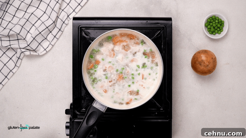 Gluten Free Chicken Pot Pie Recipe with Flaky Crust 12 Add the additional ingredients, including the chicken stock and milk, and simmer these until the onions turn translucent.