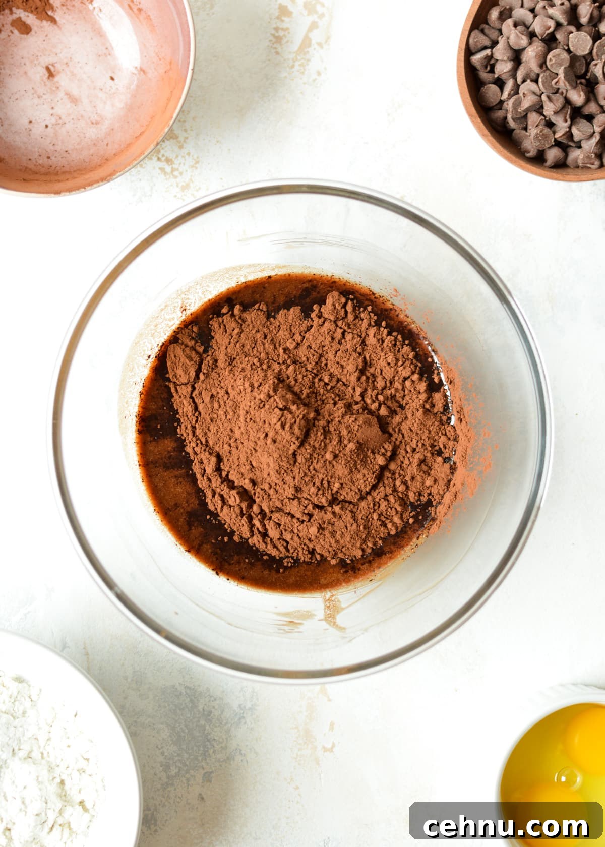 melted chocolate and butter with cocoa powder on top