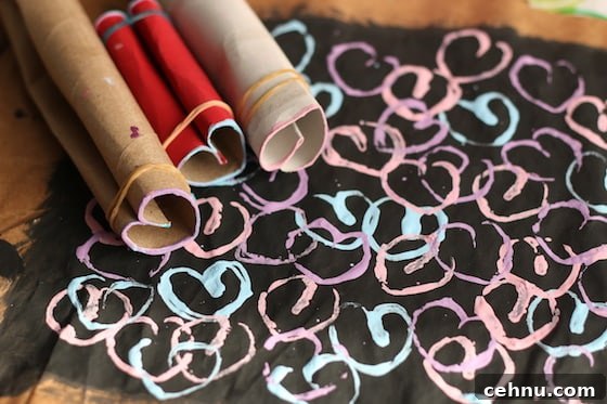 More Than 30 Toilet Paper Roll Crafts and Activities for Kids 19 cardboard rolls shaped into hearts and stamped painting