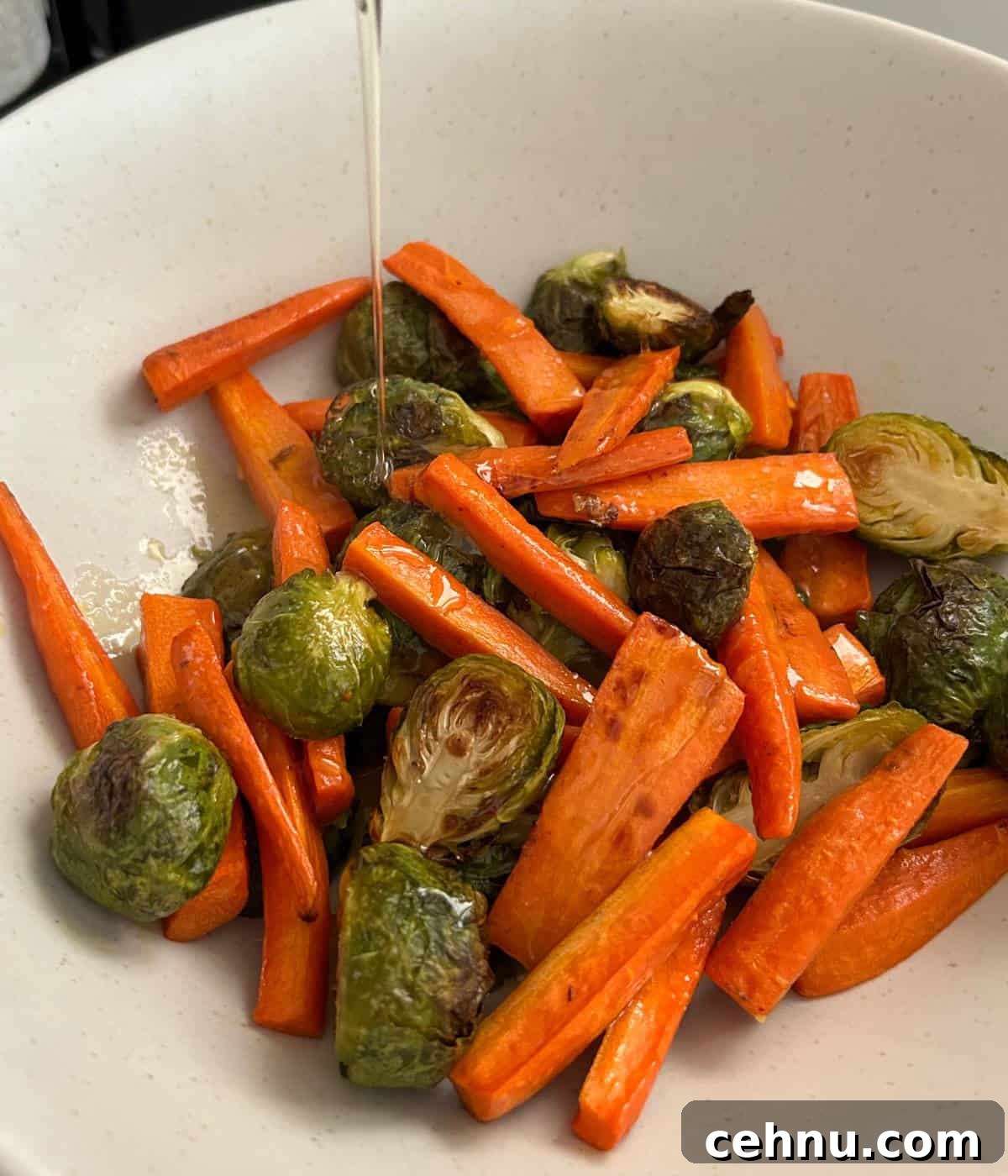Honey butter topping over roasted veggies.