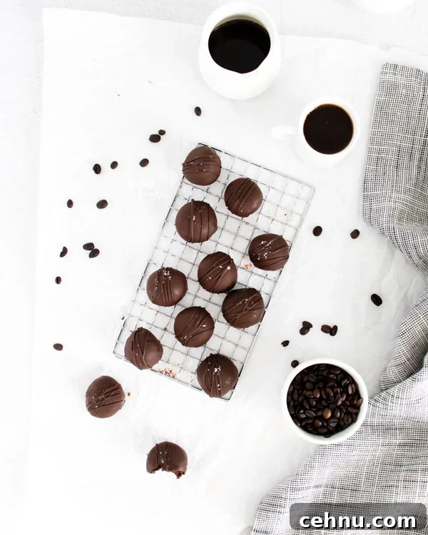 overheard shot of homemade chocolate truffles on a small wire rack