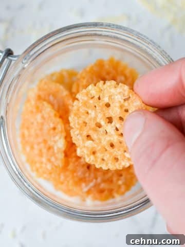 A jar with parmesan crisps inside.