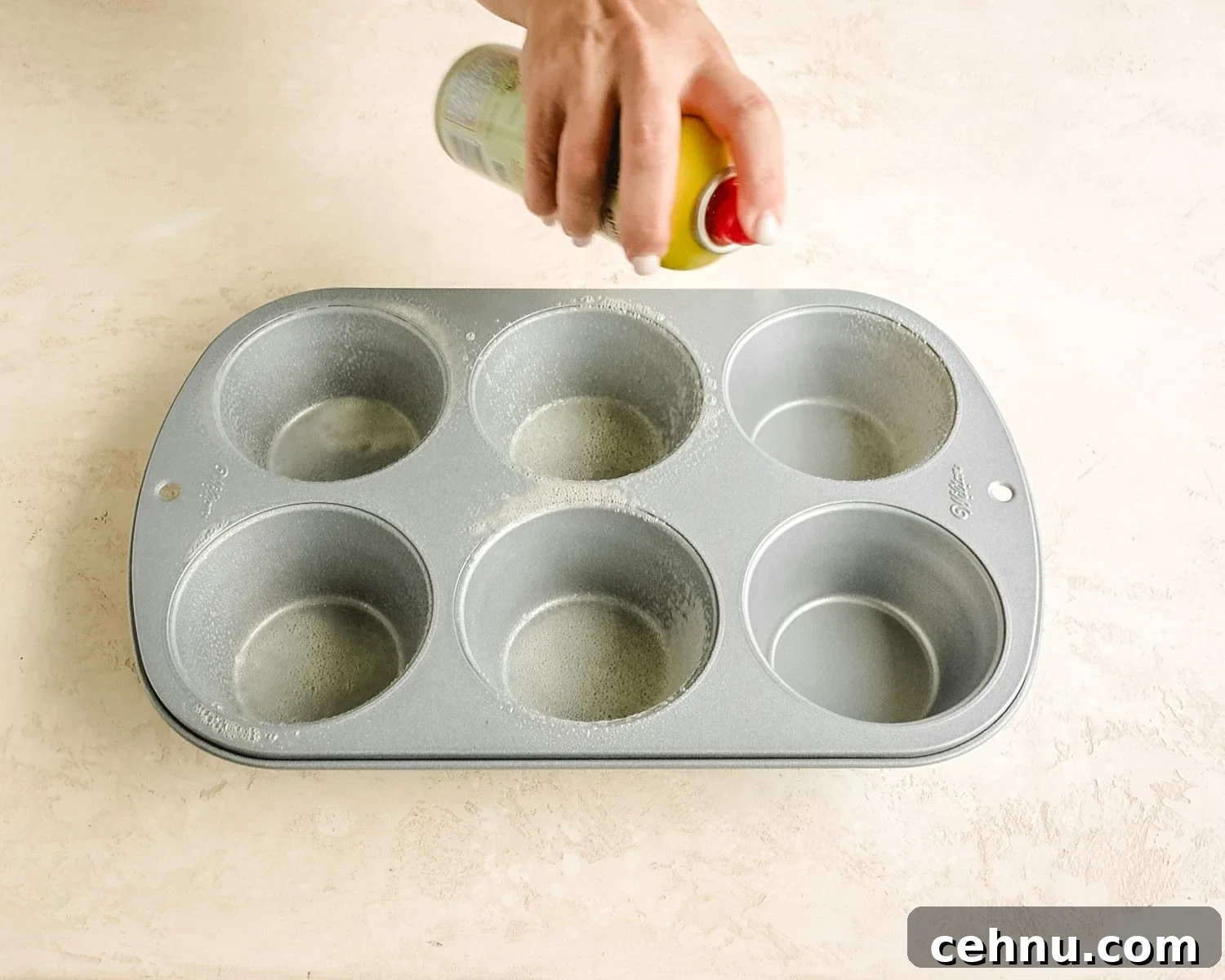 Spray a jumbo muffin pan with nonstick spray.