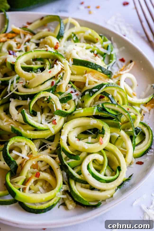 Curly zoodles with parmesan and red pepper flakes.