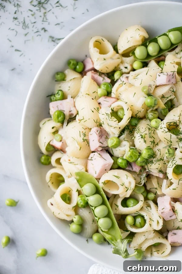 Pasta with ham and peas