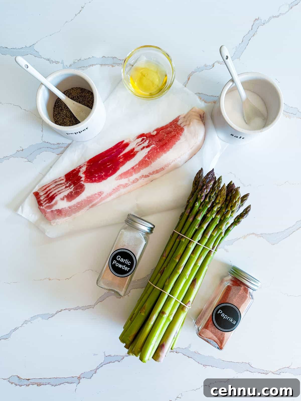 Ingredients to make air fryer bacon wrapped asparagus.