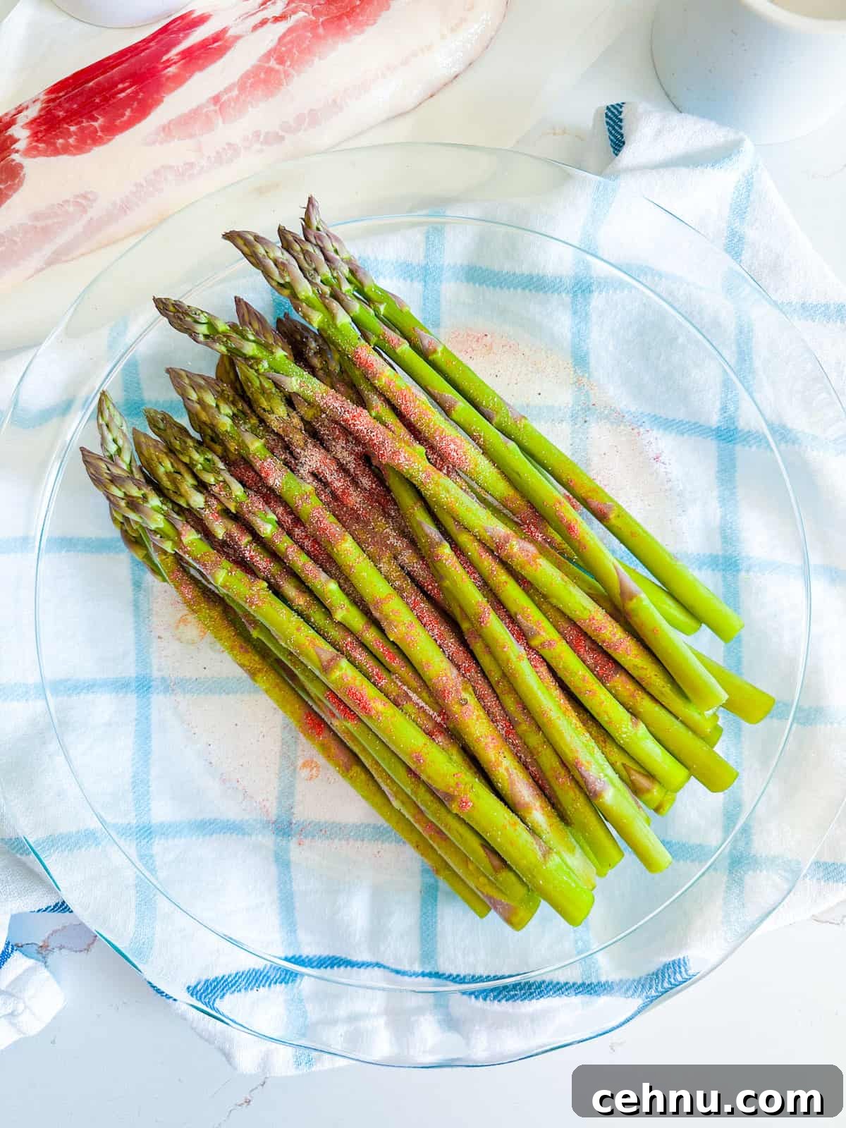 Asparagus coated in seasonings.