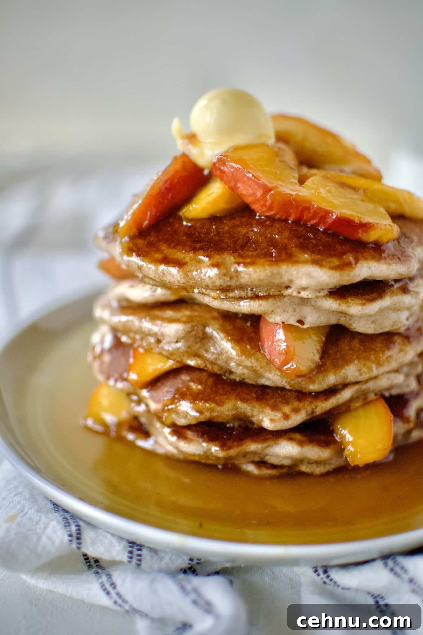 Peach Pancakes on a plate ready to eat.