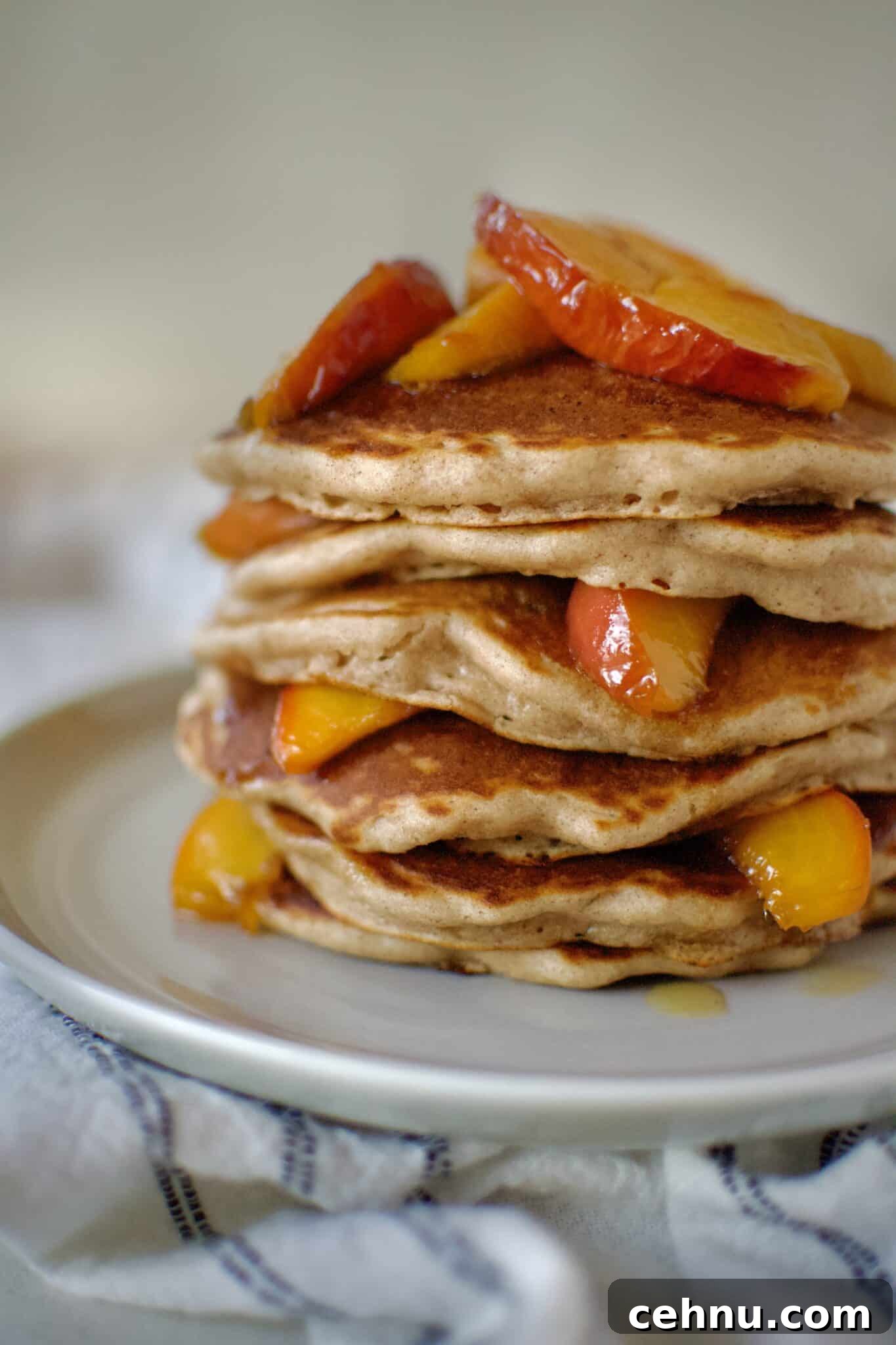 Peach Pancakes on a plate ready to eat.