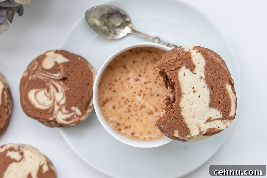 20 Gluten-Free Cookie Recipes for Holiday Parties and Gifts 12 Scrumptions Gluten-Free shortbread Cookie on top of a mug with hot chocolate