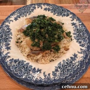 How to Make a Quick Kipper Snack Meal 14 Kippers with rice and parsley mixture in bowl.