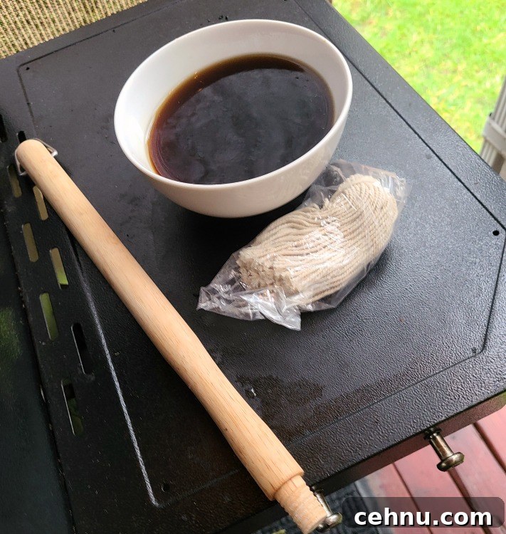 Bowl Of Coca Cola With Grilling Mop On Pitboss Grills Side Table 