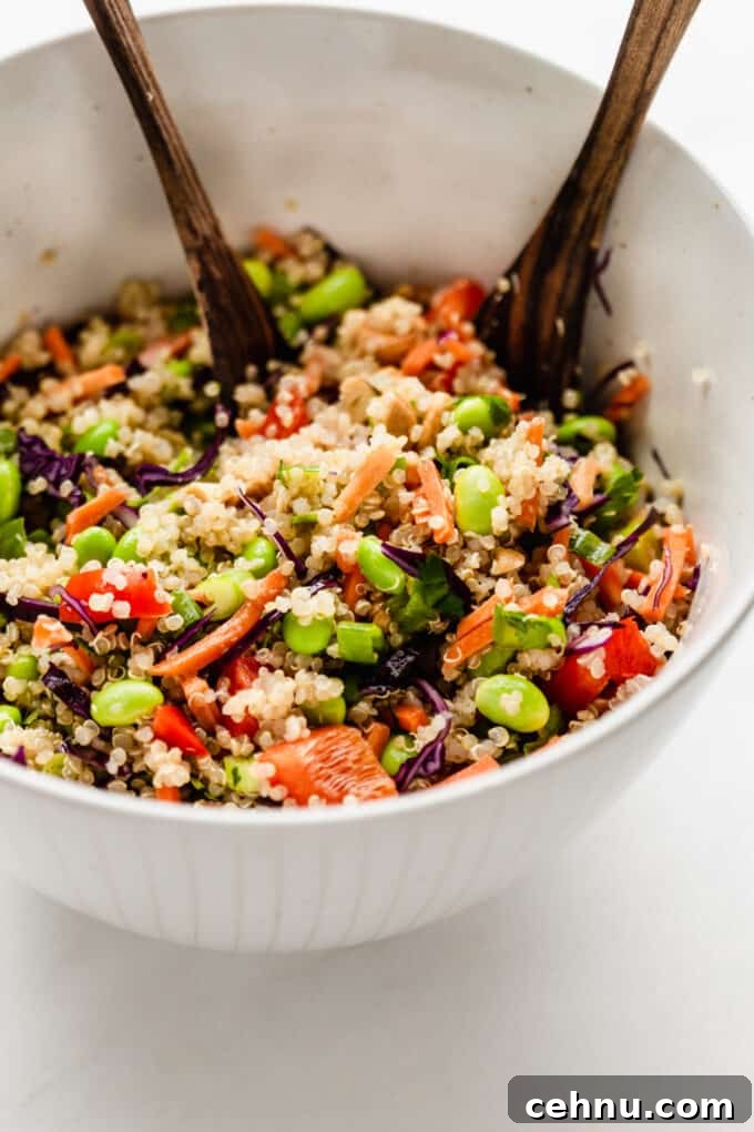 a mixing bowl with edamame and quinoa salad