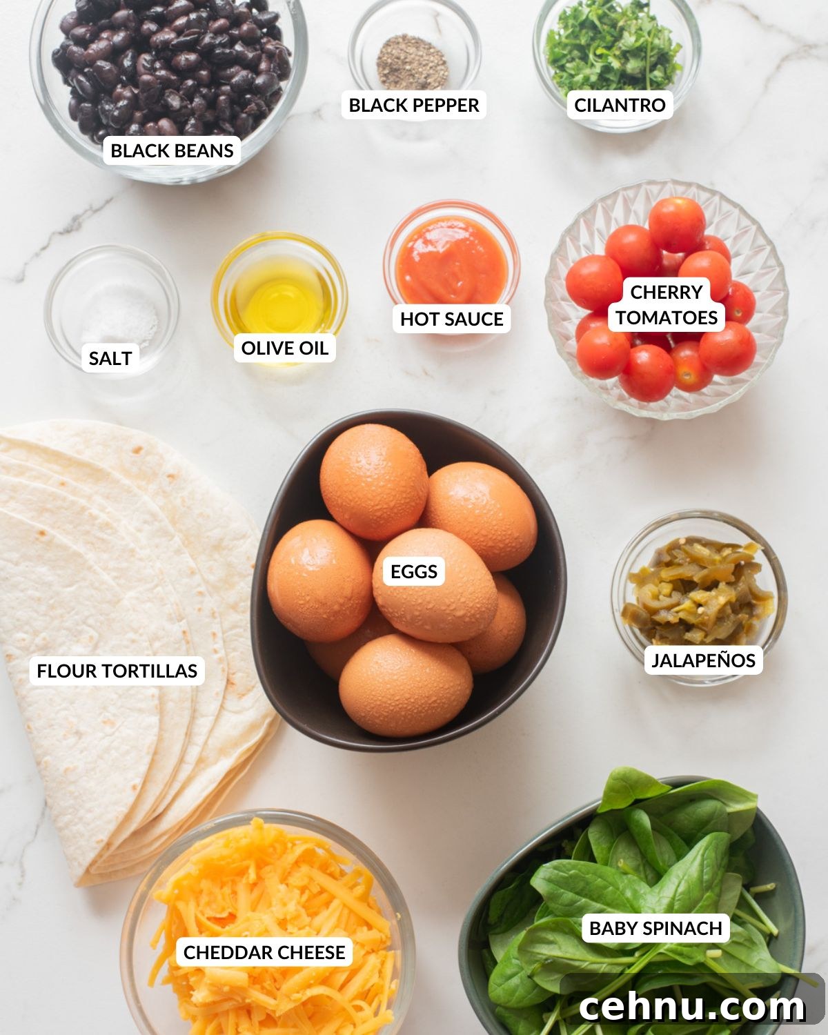 An overhead image of the ingredients of vegetarian breakfast quesadilla.