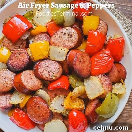 Air Fryer Garlic Parmesan Potato Wedges 9 air fryer sausage and peppers in a white plate
