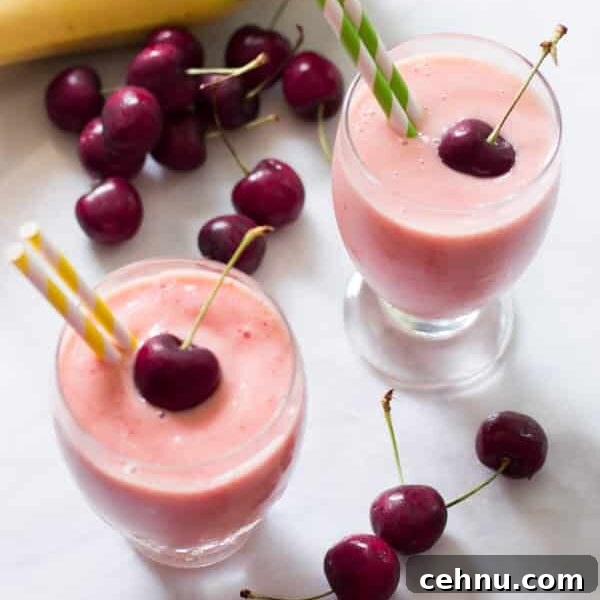 Easter Menu Ideas: Brunch, Dinner and Dessert Recipes 11 Cherry pineapple smoothies in glass cups with straws and a cherry on top.