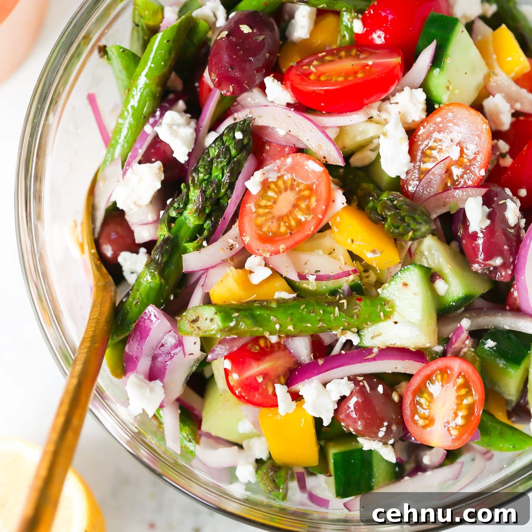 Easter Menu Ideas: Brunch, Dinner and Dessert Recipes 16 Asparagus Greek chopped salad in a bowl.