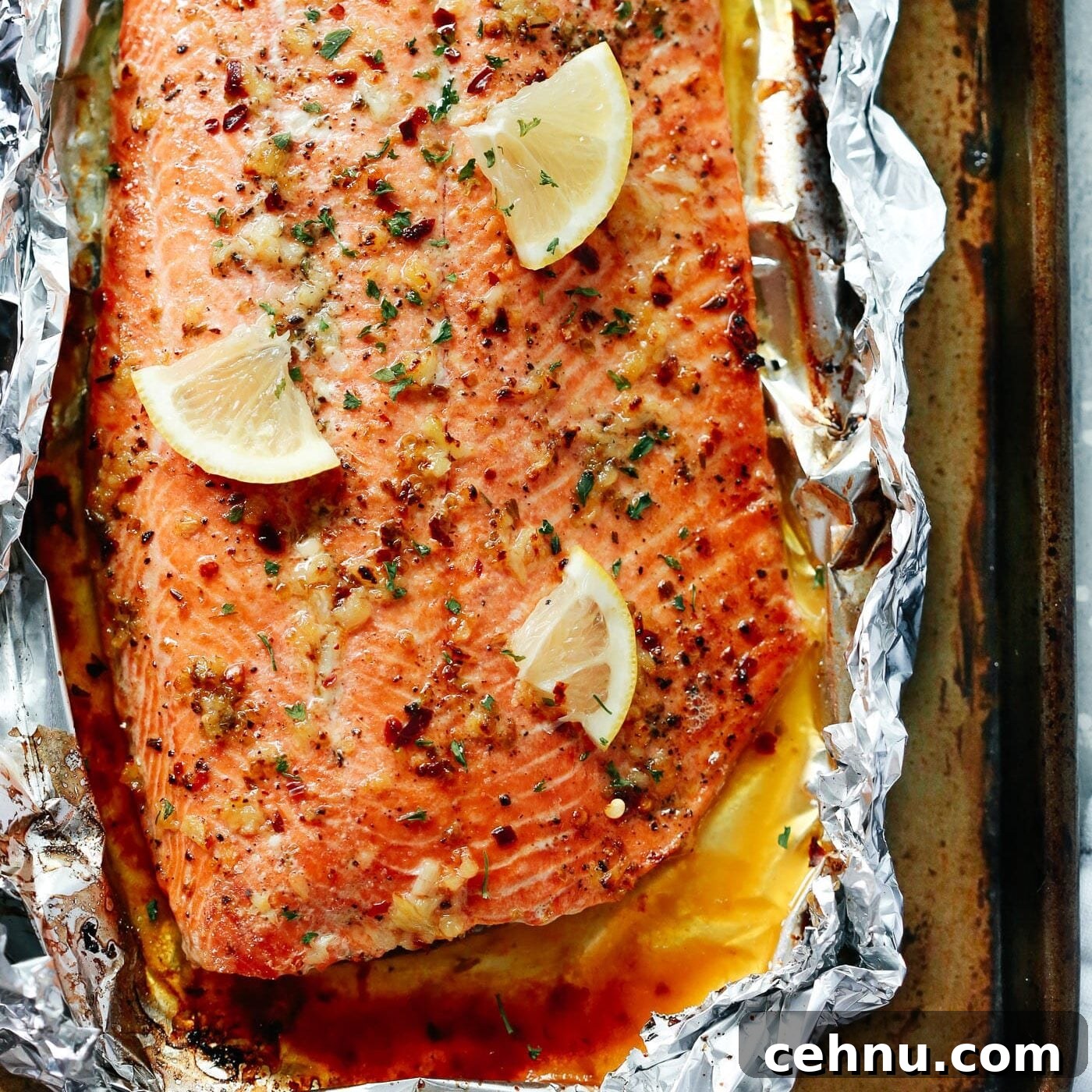 Easter Menu Ideas: Brunch, Dinner and Dessert Recipes 27 Overhead view of baked salmon in foil.