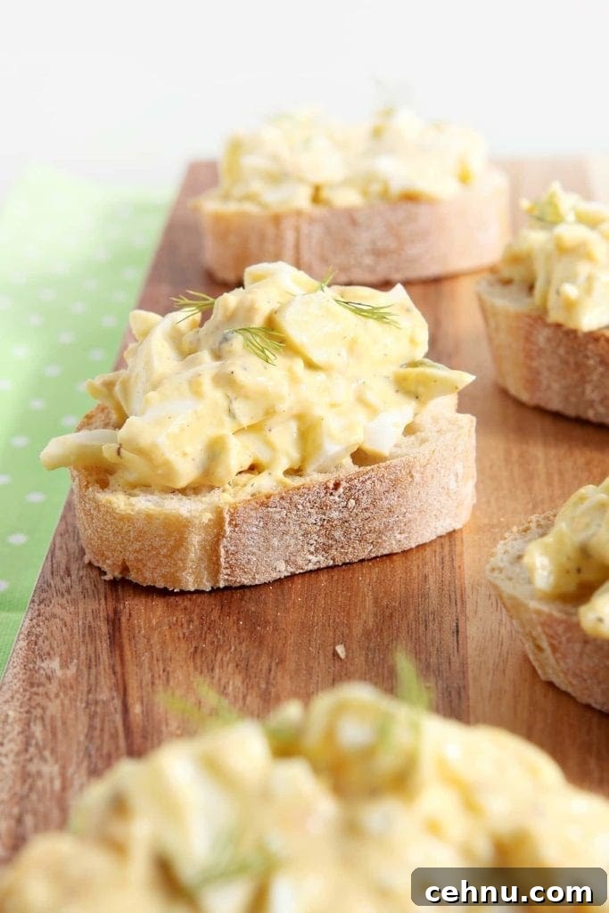 Deviled Egg Bruschetta on wood board